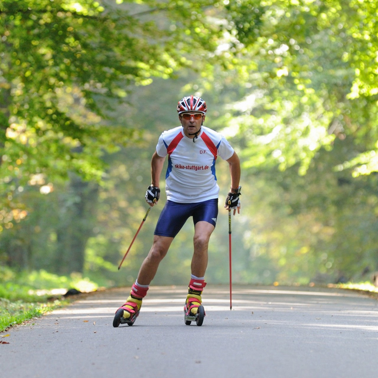 A man skating on a v07 RED skike Cross Skate