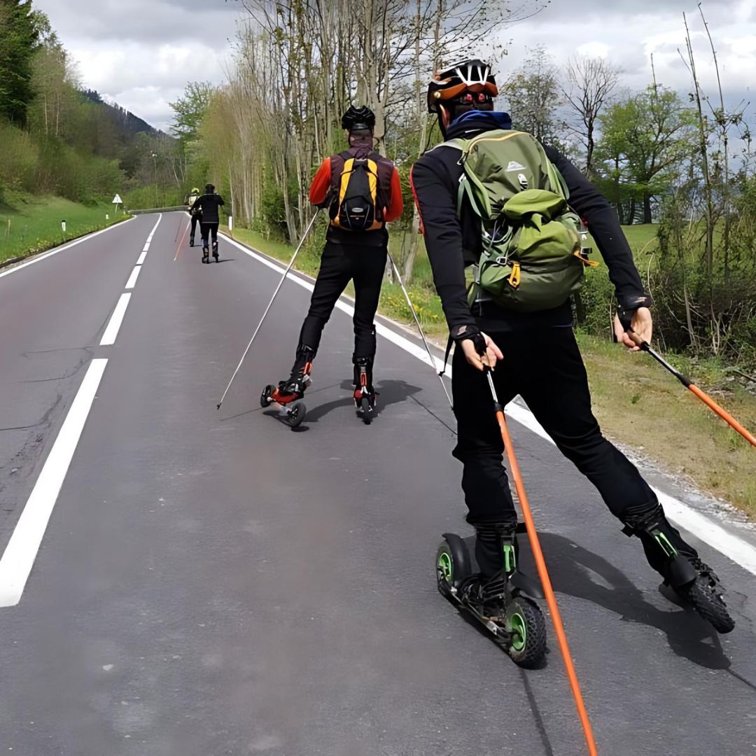 4 Cross Skaters on an asphalt road